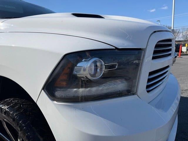 2014 RAM 1500 4WD Quad Cab 6.4 Ft Box Sport