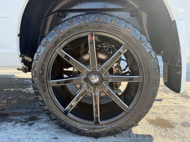 2014 RAM 1500 4WD Quad Cab 6.4 Ft Box Sport