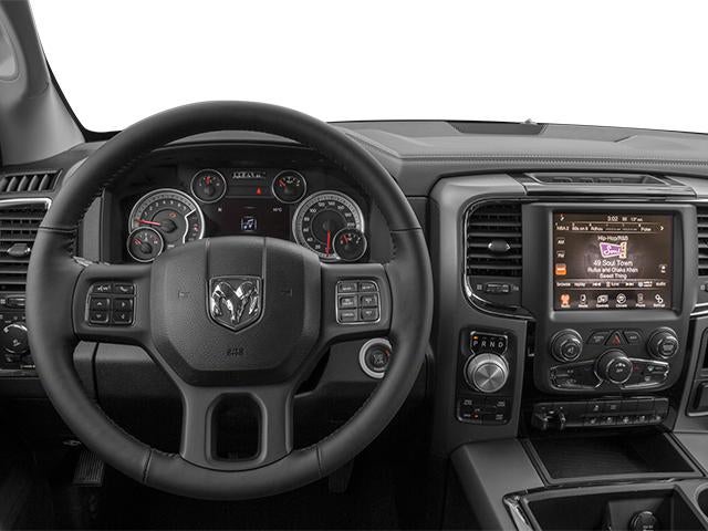 2014 RAM 1500 4WD Quad Cab 6.4 Ft Box Sport