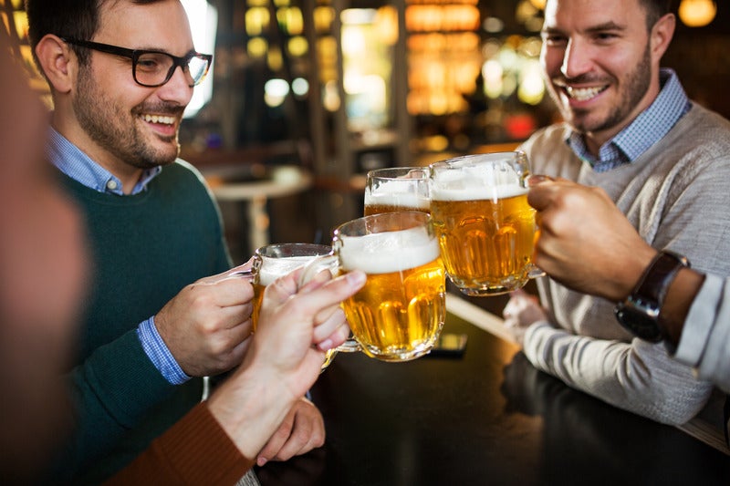 Coworkers Clinking Glasses - Arooga's